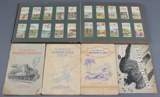 An album of cigarette cards including Players motor cars, aeroplanes (civil), album of Wills railway engines and an album of Brooke Bond cards Birds of Prey 