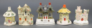 A Victorian porcelain Staffordshire pastel burner in the form of a castle 4", 2 others in the form of lodge houses 3" and 2 others in the form of houses 4" 