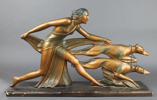 An Art Deco gilt painted plaster figure group of a lady with 2 running Afghan hounds 17"h x 29"w x 6 1/2"d 