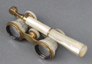 A pair of gilt metal and mother of pearl opera glasses 