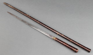 A Victorian sword stick with 17" blade contained in a "briar" scabbard 