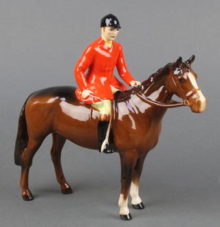 A Beswick figure - Huntsman on a brown horse model no. 1501 8 1/4" 
