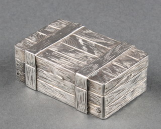 A novelty silver pill box in the form of a wooden trunk Birmingham 1977 1 1/2" 