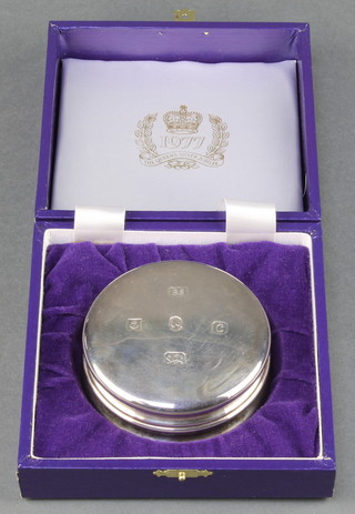 A Silver Jubilee silver paperweight of circular form, boxed Birmingham 1977