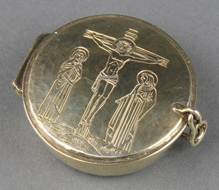 Omar Ramsden, a silver gilt Pyx box, the lid decorated with Christ on the cross with 2 attendants London 1930, 36 grams 