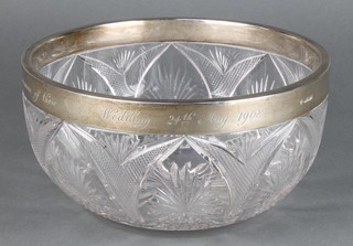 A cut glass fruit bowl with silver inscribed rim Sheffield 1905