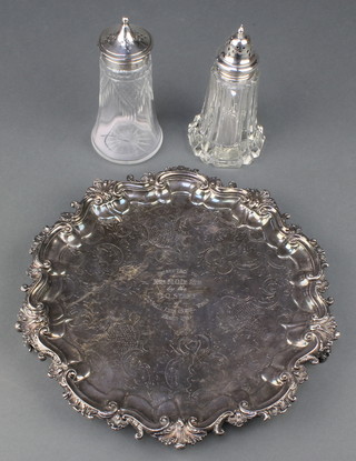 A silver plated salver with fancy rim, 2 plated mounted shakers 