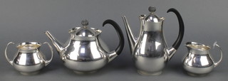 A stylish silver plated Mappin & Webb 4 piece tea and coffee set with ebony mets, designed by Eric Clements 