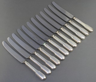 A set of 12 silver handled dinner knives