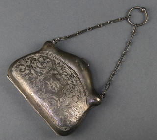 A novelty silver purse with chased floral decoration Birmingham 1916