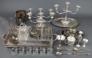 A silver plated ladle and minor plated items