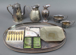 A silver plated coffee pot, an oval plated tray and minor plated items