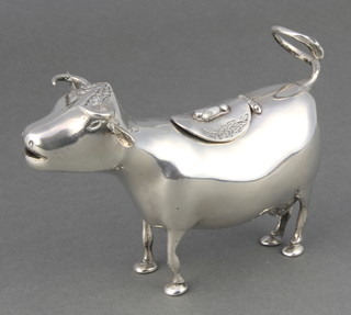 A Continental silver cow creamer with chased floral decoration 165 grams, 5 1/2" 