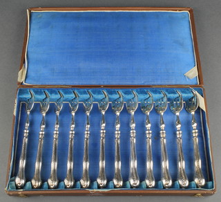 A set of 12 Dutch silver lobster forks in a fitted case 