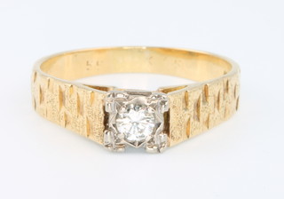 An 18ct yellow gold single stone diamond ring size O 