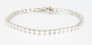 A silver and cubic zirconia line bracelet