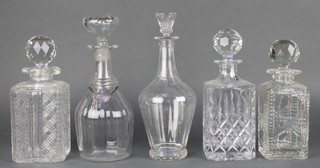 A 19th Century mallet shaped decanter and stopper 10 1/2", 3 square spirit decanters and stoppers and a mallet shaped decanter and stopper