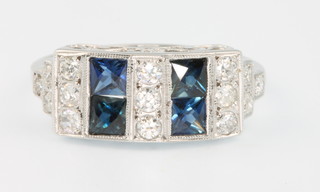 An 18ct white gold Art Deco style sapphire and diamond ring size O 