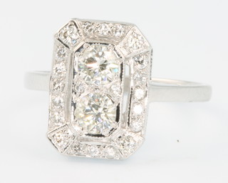 An 18ct white gold Art Deco style up finger diamond ring, approx. 0.80ct, size N 1/2