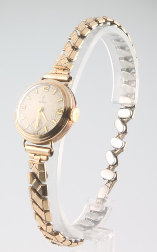 A lady's 9ct yellow gold Tudor wristwatch with seconds at 6 o'clock on a gilt bracelet 