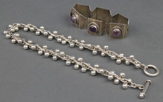 A stylish Continental silver necklace and a ditto amethyst mounted bracelet 131 grams 