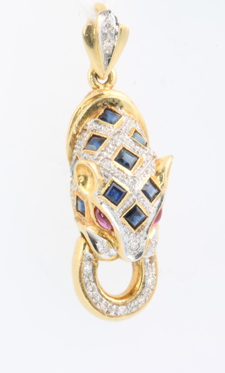 An 18ct yellow gold gem set Cartier style leopard pendant