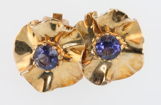 A pair of stylish 9ct yellow gold gem set ear clips 