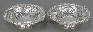 A pair of George III Irish pierced silver bowls with shell and floral borders and pierced decoration Dublin 1798 6 1/2", 458 grams