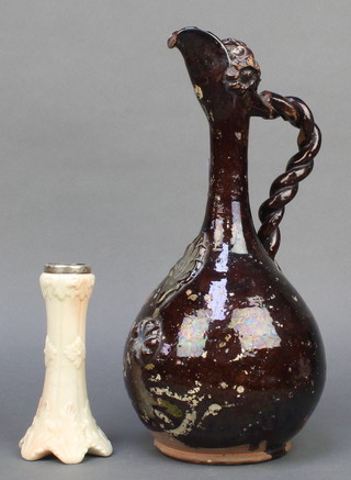A 19th Century Continental slip glazed ewer with rope twist handle 14" and a Locke and Worcester vase 6"
