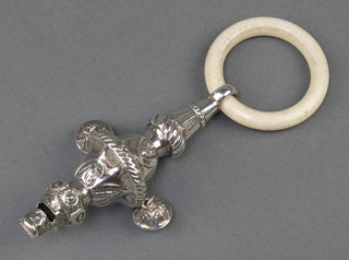 A Victorian repousse silver teether, rattle, whistle 