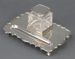 A silver inkstand with pen tray and a lidded cut glass inkwell Sheffield 1927, 7 1/2" 
