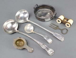 A silver plated Kings pattern ladle,1 other, a saucer ladle, a pair of gilt metal and ivory opera glasses, a twin handled silver plated dish 6", a silver plated bread fork, ditto tea strainer