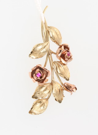 A 9ct 2 colour yellow gold floral brooch set with rubies 4.6 grams