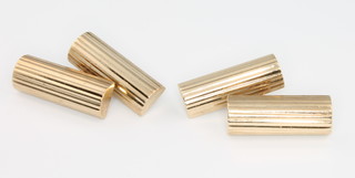 A pair of 9ct yellow gold ribbed cufflinks, 10.8 grams 
