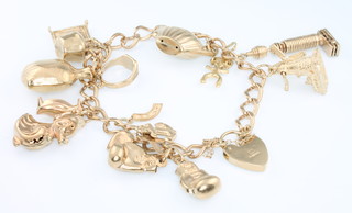 A 9ct yellow gold charm bracelet 35.6 grams