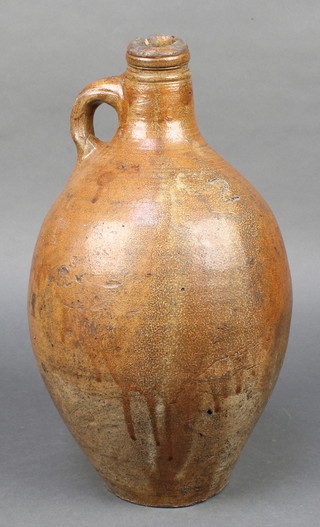 A 19th Century stoneware bottle with simple handle inscribed number "2" 13" 