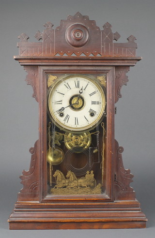 A 19th Century American shelf alarm clock with paper dial, alarm dial, contained in a pine case, the glazed door decorated a carriage driving scene 