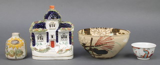 A Victorian Staffordshire model of a house with encrusted flowers 6", a Studio bottle vase 3", a Japanese moulded bowl 7" and an 18th Century famille rose teabowl decorated with figures 2" 