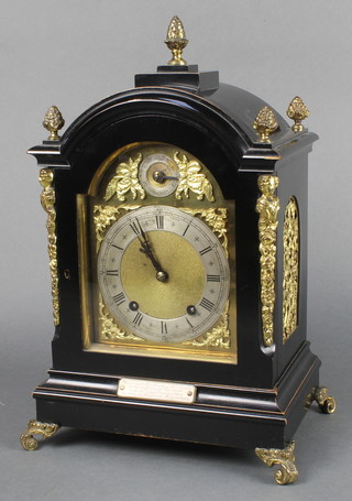 Hanford Brothers, a Georgian style striking bracket clock with arched gilt dial and silvered chapter ring contained in an ebonised and gilt mounted case with presentation plaque dated 1891