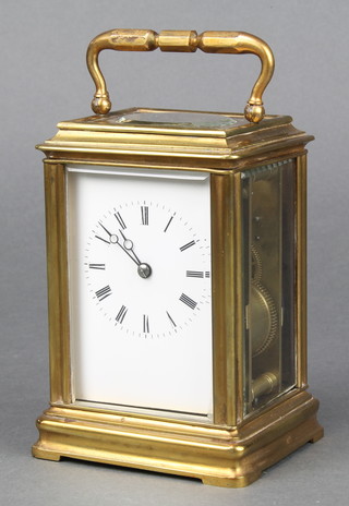 A 19th Century French 8 day striking carriage clock with enamelled dial and Roman numerals contained in a gorge case 