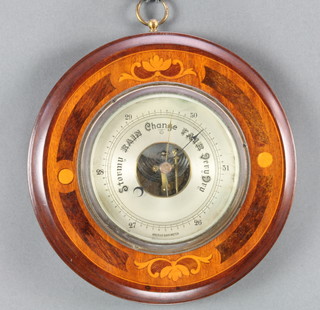 An aneroid barometer with silvered dial contained in a circular inlaid mahogany case 9" 