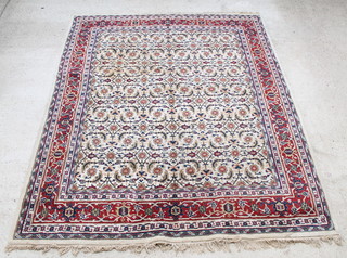 A Sarough white ground carpet with floral design to the centre 119" x 94" 