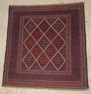 A red and blue ground Gazak rug with diamond field within multi-row borders 46" x 43" 