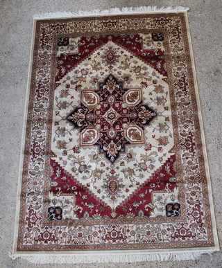 A Belgian cotton white and red ground Heriz style rug with central medallion 92" x 63" 