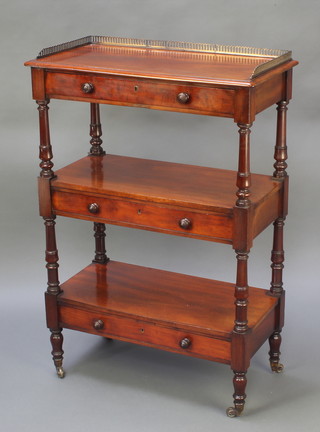 A Victorian rectangular mahogany 3 tier what-not with brass three-quarter gallery, fitted 3 drawers and raised on turned and block supports 40"h x 27"w x 14"d 