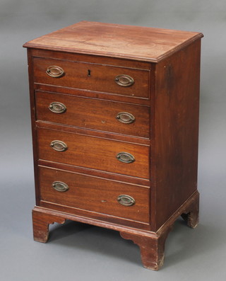 A 19th Century bleached mahogany chest of 4 long drawers with brass oval drop handles, raised on bracket feet 29"h x 19 1/2"w x 15 1/2"d