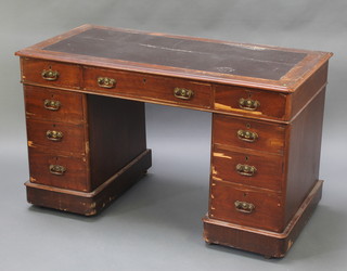 A Victorian mahogany desk with brown writing surface above 1 long and 8 short drawers 28"h x 47"w x 23 1/2"d 