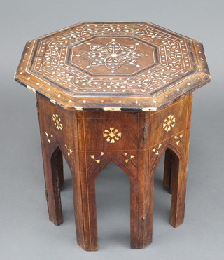 An octagonal Moorish inlaid hardwood folding occasional table with ebony and ivory inlay, 12"h x 12"w x 11 1/2"d 