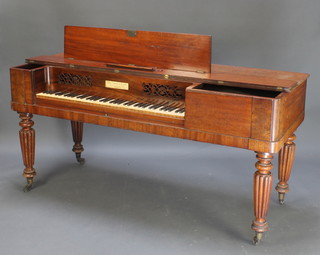Broadwood, a 19th Century square piano raised on turned and reeded supports 33"h x 69"w x 28"d
