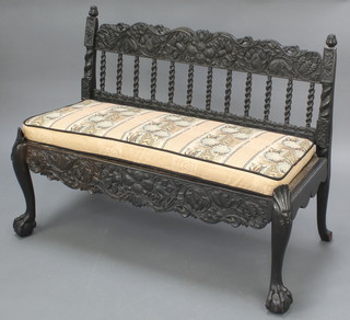 A 19th Century Anglo Indian carved hardwood hall bench with spiral turned decoration, heavily carved throughout and raised on cabriole supports 30"h x 40"w x 18" 
